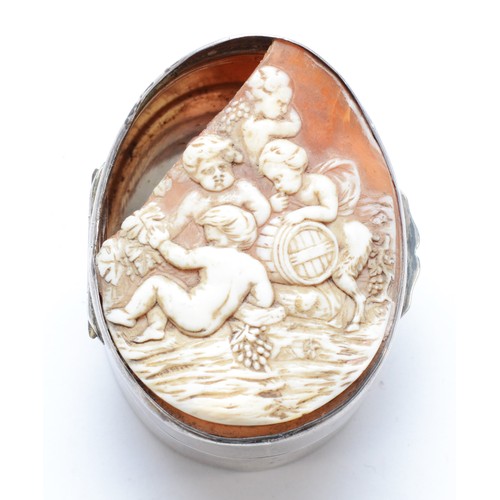 67 - An unmarked silver oval box, with broken shell cameo hinged cover, 5.5 x 4 x 3cm, 47gms