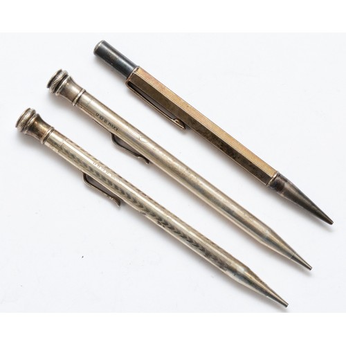 76 - Two Eversharp silver propelling pencils and another silver pencil.