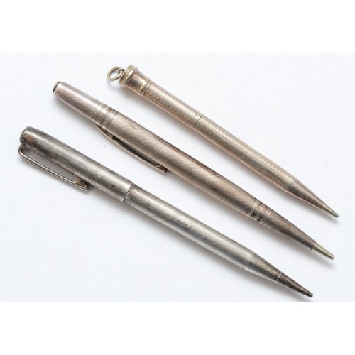 77 - A Yard O Lead silver propelling pencil and two Sterling Silver propelling pencils.