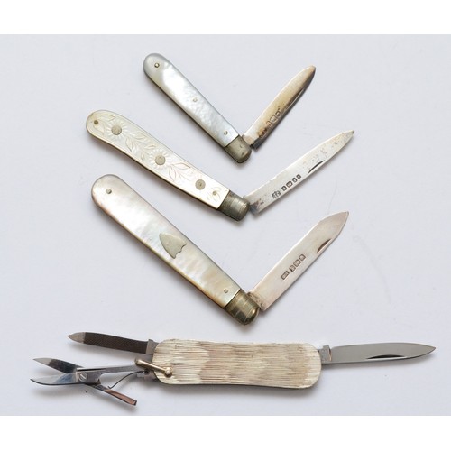 79 - A Victorian silver and mother of pearl fruit knife, Sheffield 1873, two other later examples and a 9... 