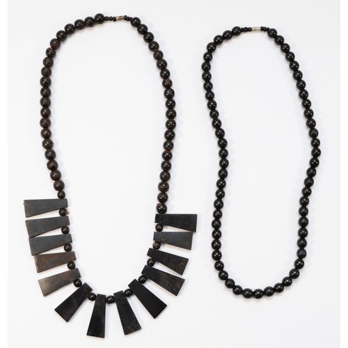 184 - A Jet fringe necklace with bead back, together with a 56cm together with a bead necklace