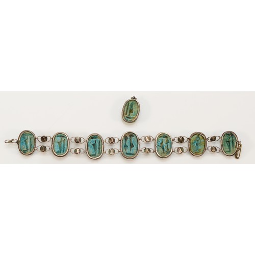 186 - A low grade silver and faience scarab beatle bracelet, 17cm, together with a matching pendant.