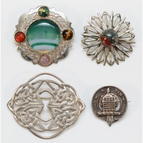 198 - A Scottish silver FIN clan brooch, Edinburgh 1995, and three other Scottish silver brooches.