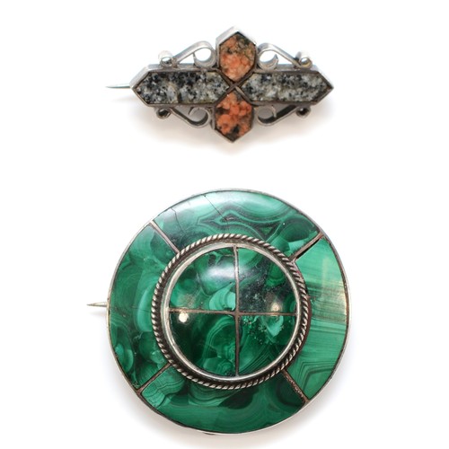 204 - A Victorian unmarked silver and malachite target brooch, 35mm and a Scottish silver and granite broo... 