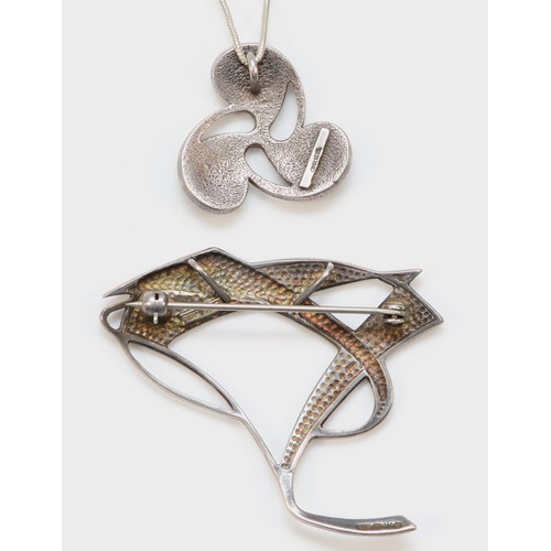 206 - Ola Gorie, a Scottish silver and enamel scrool pendant, 22mm, chain and Pat Chenney, a silver and en... 