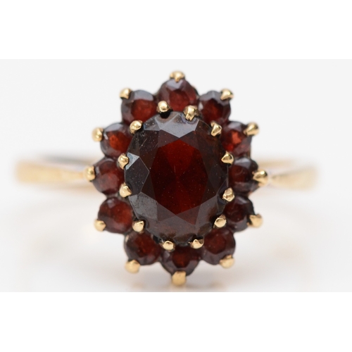 236 - A 9ct gold and garnet cluster ring, L, 2.8gm