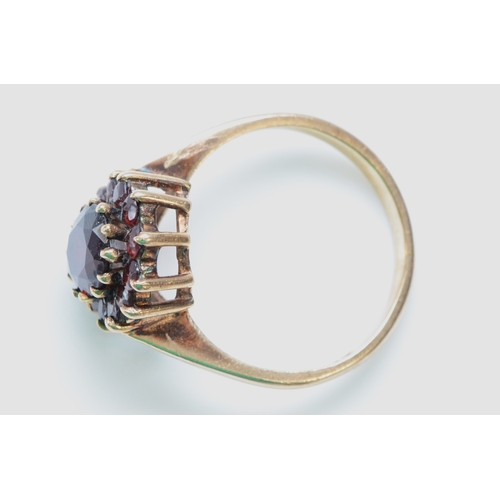 236 - A 9ct gold and garnet cluster ring, L, 2.8gm