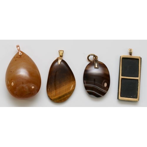 240 - A 9ct gold mounted carved nephrite jade pendant, 48mm and three 9ct gold mounted hardstone pendants ... 