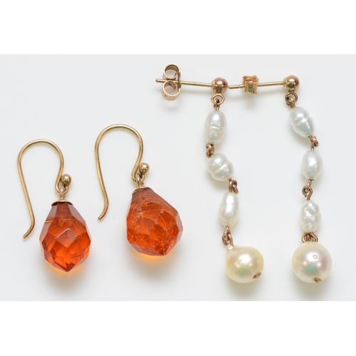 242 - A 9ct gold mounted pair of cultured pearl ear rings, 40mm and a 9ct gold mounted pair of facetted am... 