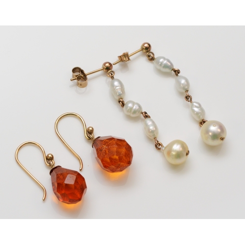 242 - A 9ct gold mounted pair of cultured pearl ear rings, 40mm and a 9ct gold mounted pair of facetted am... 