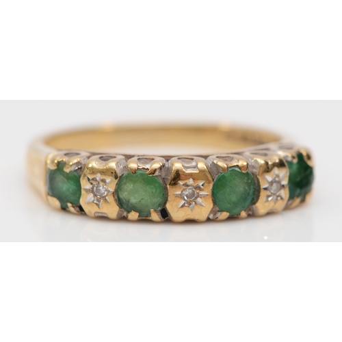 251 - A 9ct gold emerald and diamond seven stone ring, L, 2.4gm