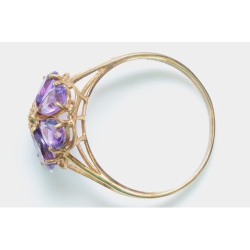 252 - A 9ct gold and amethyst flowerhead cluster ring, R, 2.1gm