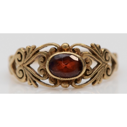 254 - A 9ct gold and garnet dress ring, M, 1.8gm