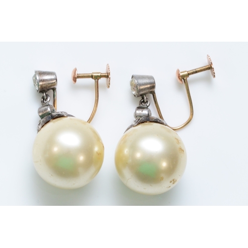 255 - A vintage pair of 9ct gold and silver imitation 9mm pearl and paste ear rings.