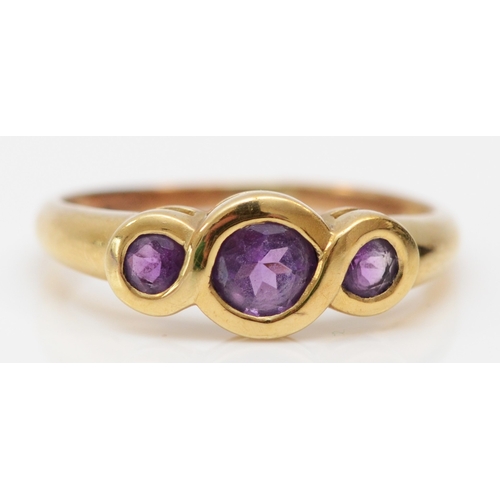 260 - A 9ct gold three stone amethyst ring, Q, 2gm