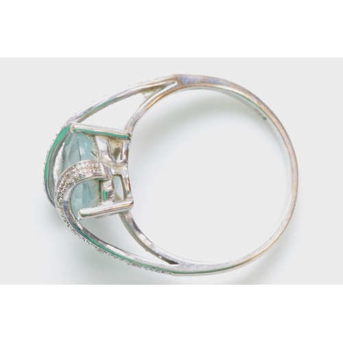 264 - A 9ct white gold heart shape topaz and diamond dress ring, N, 3gm