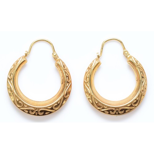 434 - A 9ct gold pair of hoop ear rings, 1.7gm