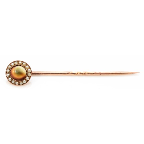 439 - A Victorian unmarked rose gold, abolone shell and half pearl stickpin, 2gm.