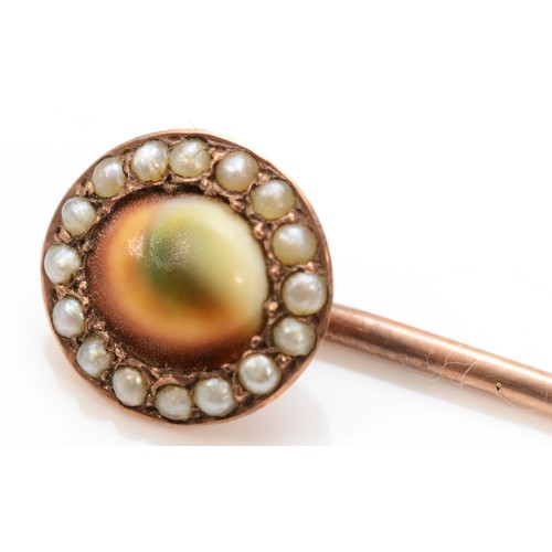 439 - A Victorian unmarked rose gold, abolone shell and half pearl stickpin, 2gm.