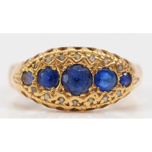 449 - An Edwardian 18ct gold sapphire and diamond chip boat shape ring, later stamped 18ct, probably a rep... 