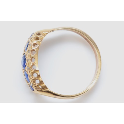 449 - An Edwardian 18ct gold sapphire and diamond chip boat shape ring, later stamped 18ct, probably a rep... 