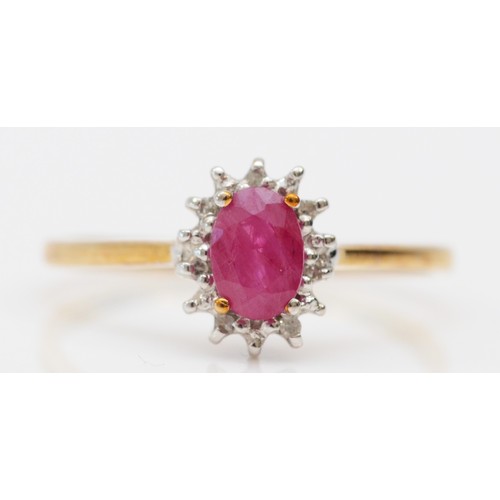 424 - A 9ct gold ruby and diamond cluster ring, O, 1.5gm