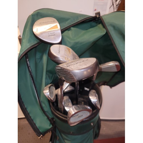 58A - A set of twelve Memphis golf clubs with golf bag.