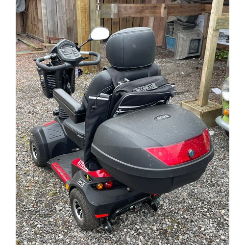 3 - A four wheeled Envoy mobility scooter, complete with rear carrier, charger and keys.