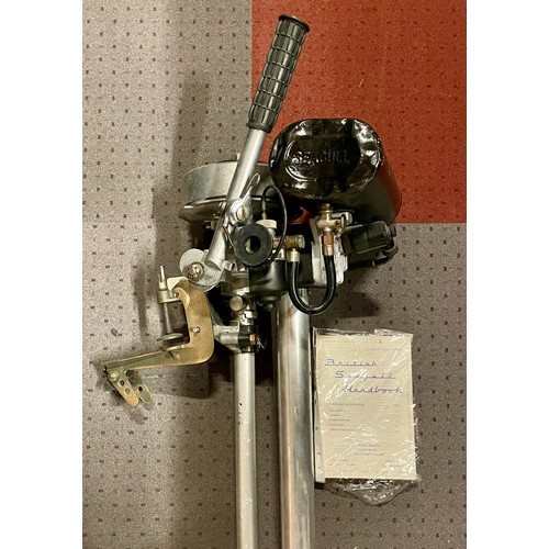 13 - A 1960s British Seagull outboard motor, with original handbook.