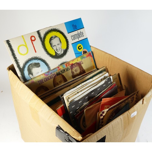 55 - A large collection of music CD's, vinyl records and tapes.