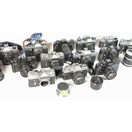 Fourteen SLR vintage film cameras to include a Praktica BCA, a Zenit E ...