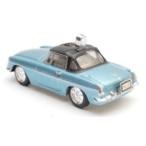 mg cigarette lighter A 1960s table lighter in the form of a MG sports car, made in Japan, the  painted metallic blue dieca