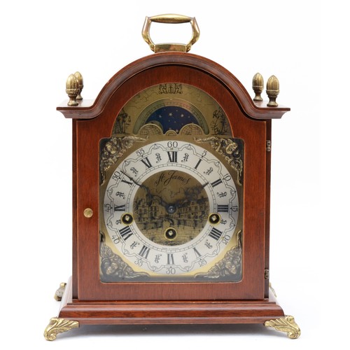 A modern Dutch mahogany case bracket clock, the arched brass dial with ...
