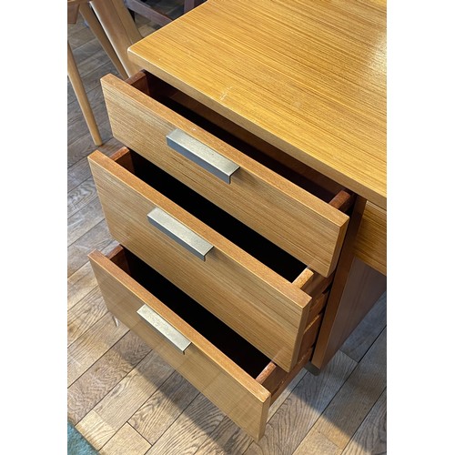 398 - A mid 20th century Stag teak dressing table, model S.322, mirror back over central drawer flanked by... 