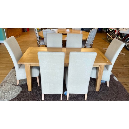 400 - A modern solid light oak dining suite, comprising rectangular top table on square tapered legs, with... 