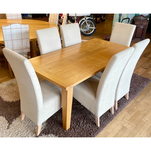 400 - A modern solid light oak dining suite, comprising rectangular top table on square tapered legs, with... 