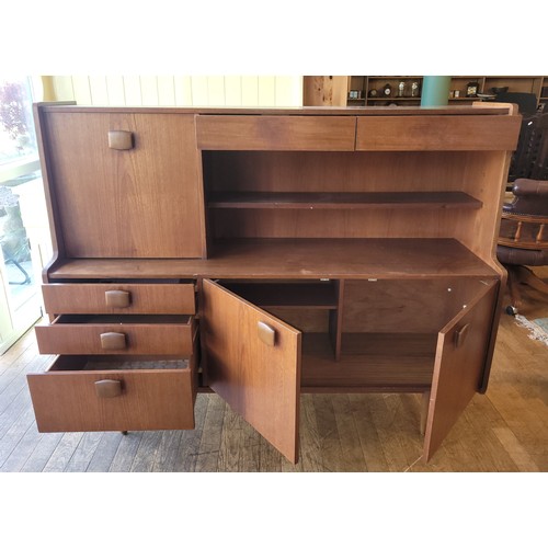 403 - Stonehill Furniture: A mid 20th century teak sideboard/drinks cabinet.
W152, H121, D45cm.