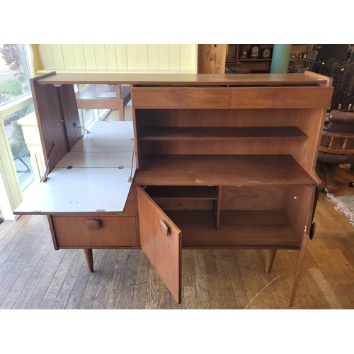 403 - Stonehill Furniture: A mid 20th century teak sideboard/drinks cabinet.
W152, H121, D45cm.