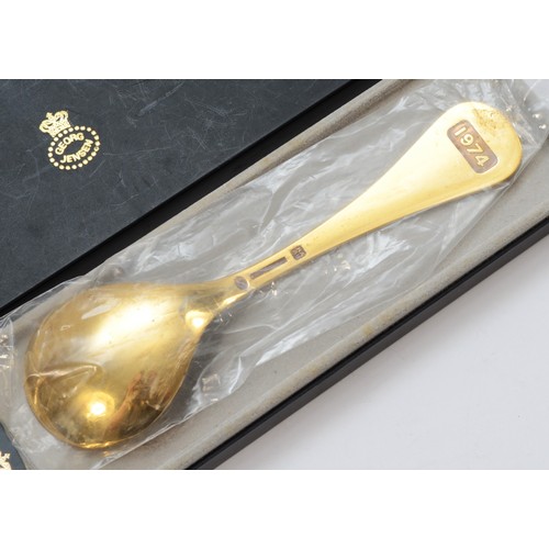 17 - Georg Jensen, a silver gilt and enamel 1974 Year spoon, by Rigmor Andersen & Annelise Bjorner, 15cm,... 