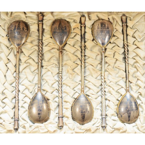 20 - A Russian silver gilt and niello set of six lemon tea spoons, by Stepan Levin, Moscow c.1900, 84 kol... 