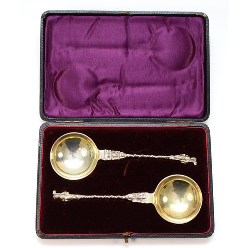 5 - A Victorian silver pair of serving spoons, no maker, Birmingham 1896, with cast St. Peter handles, 1... 