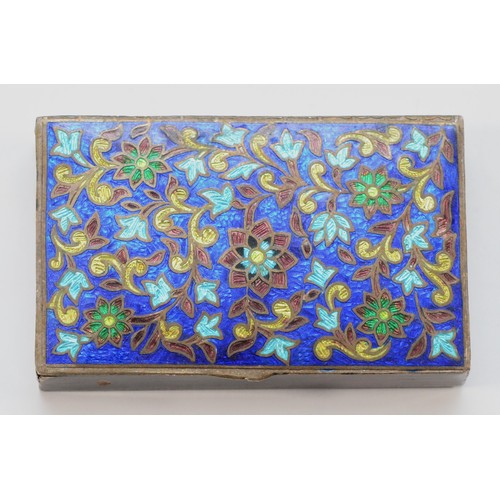 62 - An unmarked white metal and enamel snuff box, possibly Indian, with floral decoration, 7.5 x 4.5 x 1... 