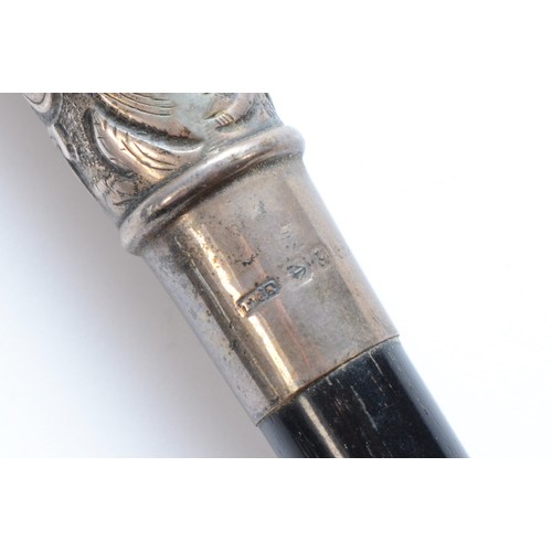 65 - A Victorian silver and ebony conductors baton, Birmingham 1890, 52cm. 
Central plaque has had an ins... 