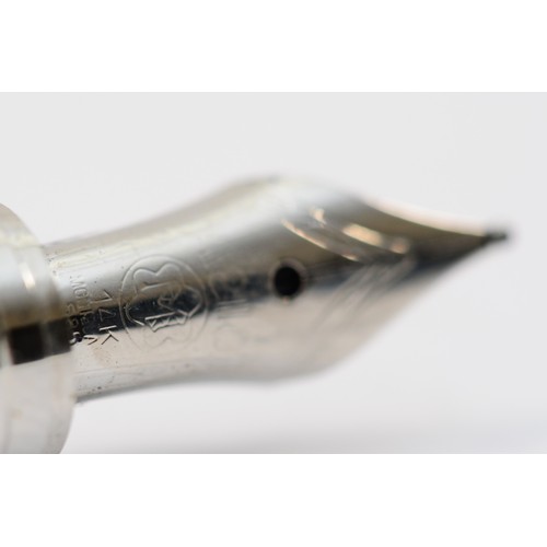 85 - WITHDRAWN. Mont Blanc, Starwalker metal and rubber fountain pen, with 14K white gold nib, push fill ... 