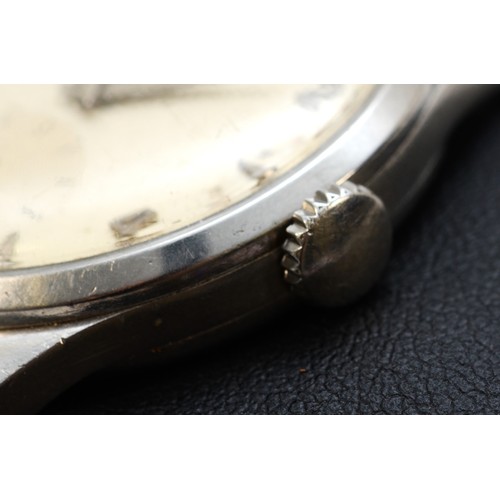 95 - Omega, a stainless steel manual wind gentleman's wristwatch, c.1954, off white dial with subsidiary ... 