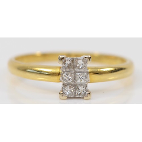 118 - An 18ct gold and Princess cut diamond panel ring, claw set with six stones, stated weight 0.20cts, O... 