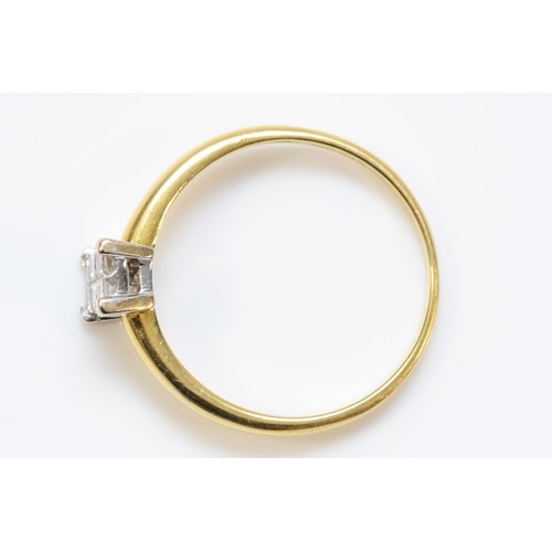 118 - An 18ct gold and Princess cut diamond panel ring, claw set with six stones, stated weight 0.20cts, O... 