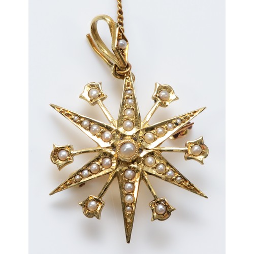 122 - A Victorian 15ct gold and half pearl eight ray star brooch/pendant, detachable bail, 29mm, 4.5gm