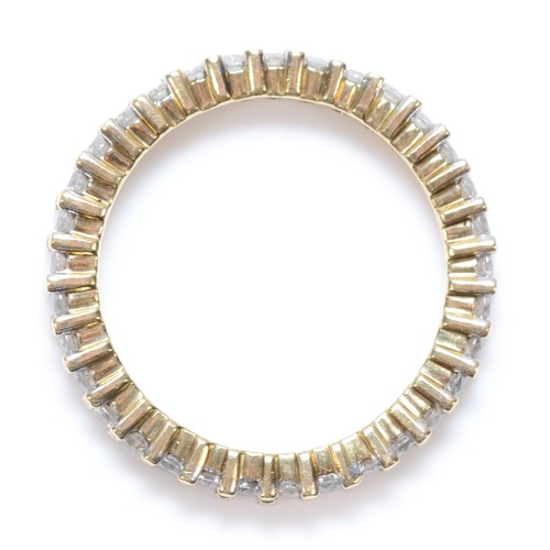 125 - A 9ct gold and brilliant cut diaond full eternity ring, 34 stones, approximately 0.70cts total, O, 2... 