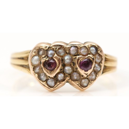 126 - A Victorian 9ct gold ruby and half pearl double heart ring, Birmingham 1899, N 1/2, 1.8gm